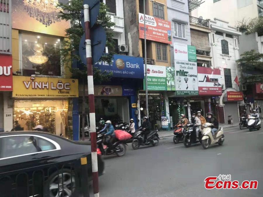 Photo taken on Feb 25 shows busy roads in Hanoi, Vietnam before Kim-Trump Summit. (Photo; China News Service/Meng Xiangjun)