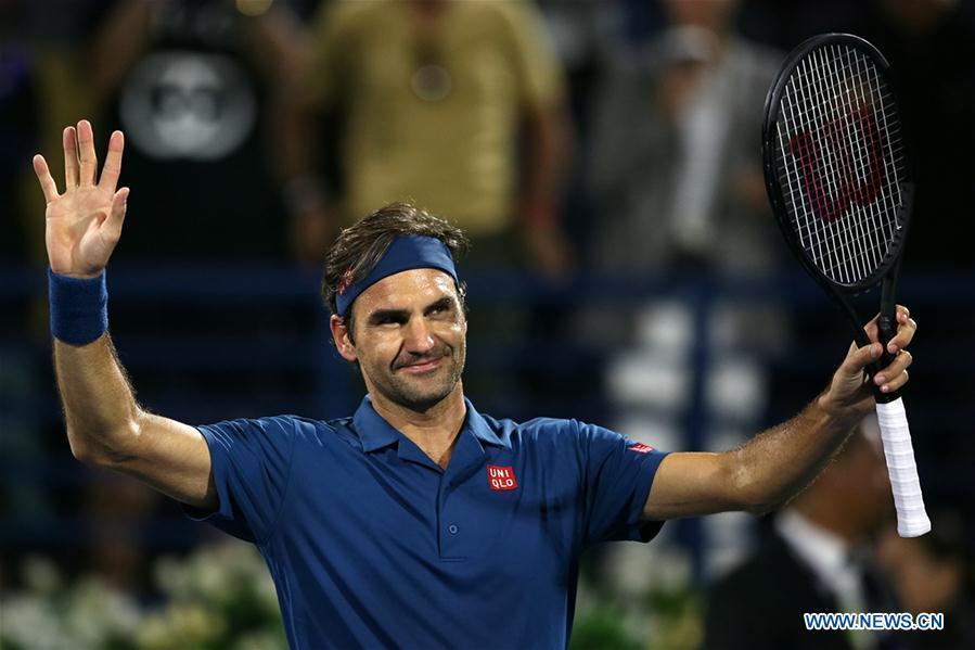 Roger Federer of Switzerland celebrates after winning the singles first round match between Roger Federer of Switzerland and Philipp Kohlschreiber of Germany at the ATP Dubai Duty Free Tennis Championships 2019 in Dubai, the United Arab Emirates, Feb. 25, 2019. Roger Federer won 2-1. (Xinhua/Mahmoud Khaled)