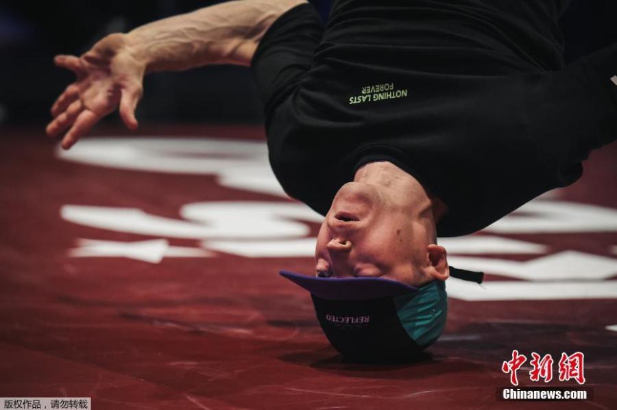 Dancers execute backflips and freezes, gyros and headspins with gravity-defying agility in front of an adoring audience at Battle Pro in Paris, France, Feb. 23, 2019. Organizers of Paris 2024 have proposed that breakdancing should be included as a new sport in the Olympic program. (Photo/Agencies)