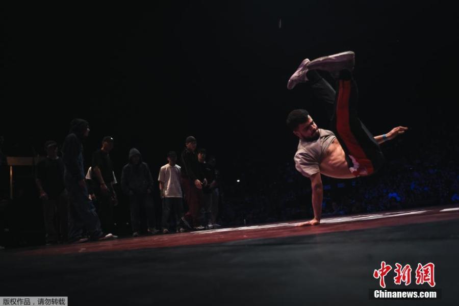 Dancers execute backflips and freezes, gyros and headspins with gravity-defying agility in front of an adoring audience at Battle Pro in Paris, France, Feb. 23, 2019. Organizers of Paris 2024 have proposed that breakdancing should be included as a new sport in the Olympic program. (Photo/Agencies)