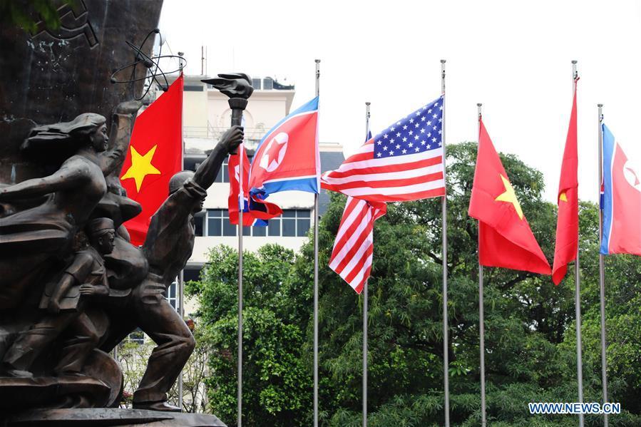Photo taken on Feb. 25, 2019 shows national flags of Vietnam, the DPRK and the United States in Hanoi, Vietnam. The second summit between top leader of the Democratic People\'s Republic of Korea (DPRK) Kim Jong Un and U.S. President Donald Trump will be held in Hanoi on Feb. 27-28. (Xinhua/Wu Xiaochu)