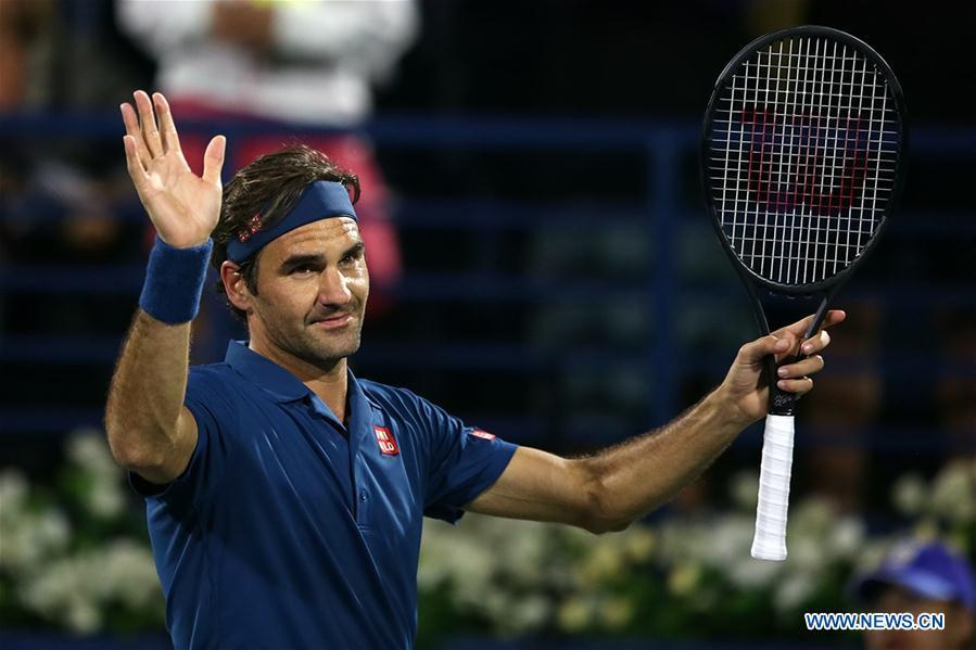 Roger Federer of Switzerland celebrates after winning the singles first round match between Roger Federer of Switzerland and Philipp Kohlschreiber of Germany at the ATP Dubai Duty Free Tennis Championships 2019 in Dubai, the United Arab Emirates, Feb. 25, 2019. Roger Federer won 2-1. (Xinhua/Mahmoud Khaled)
