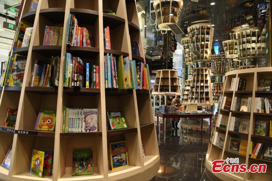 A view of the bookshelves at a bookstore in Chongqing southwestern China, Feb. 25, 2019.   The newly opened bookstore in Chongqing southwestern China has attracted over 200,000 visitors since it opened on Jan. 25.  The store quickly gained attention for its mind-boggling interior design.  (Photo/China News Service)