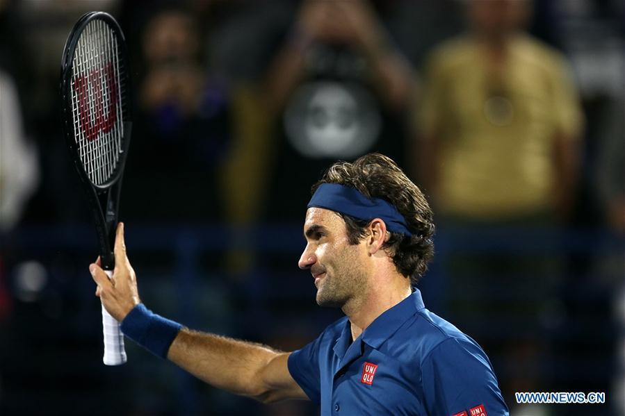 Roger Federer of Switzerland celebrates after winning the singles first round match between Roger Federer of Switzerland and Philipp Kohlschreiber of Germany at the ATP Dubai Duty Free Tennis Championships 2019 in Dubai, the United Arab Emirates, Feb. 25, 2019. Roger Federer won 2-1. (Xinhua/Mahmoud Khaled)