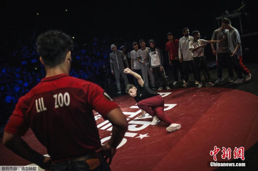 Dancers execute backflips and freezes, gyros and headspins with gravity-defying agility in front of an adoring audience at Battle Pro in Paris, France, Feb. 23, 2019. Organizers of Paris 2024 have proposed that breakdancing should be included as a new sport in the Olympic program. (Photo/Agencies)