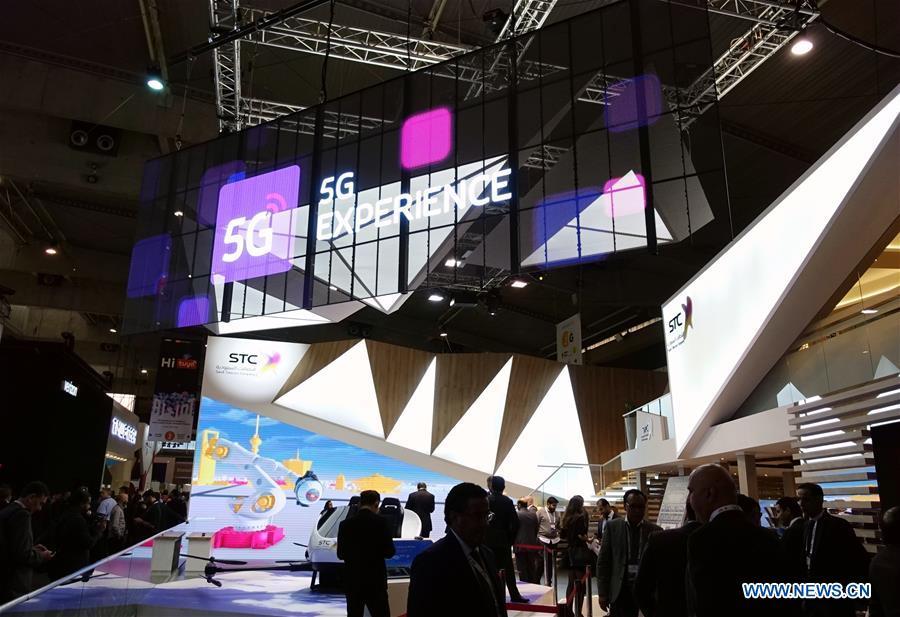 Saudi Telecom Company presents its booth with 5G mark at Mobile World Congress (MWC 2019) in Barcelona, Spain, Feb. 26, 2019. The four-day MWC 2019 opened its door on Monday, which presents the newest 5G products of the high-tech giants from all around the world. (Xinhua/Guo Qiuda)