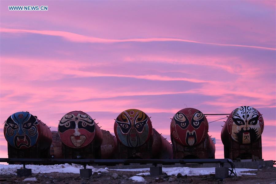 Photo taken on Feb. 13, 2019 shows oil tanks with painting of Peking Opera facial make-up at Zhongshan Station, a Chinese research base in Antarctica. The Zhongshan Station, set up on Feb. 26, 1989, was the second of four scientific research bases on the Antarctic ice sheet built by China since 1964. Today it remains a logistical transit hub for inland expedition on the icy continent. Over the past 30 years, the Zhongshan Station has grown into a modern \