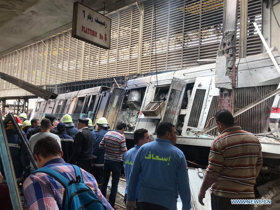 Rescuers work at a fire site at a train station in Cairo, Egypt, Feb. 27, 2019. At least 25 people were killed and more than 40 others wounded when a fire erupted inside the main train station in the city center of Egypt\'s capital Cairo on Wednesday, state-run Nile TV reported. (Xinhua/Ahmed Gomaa)