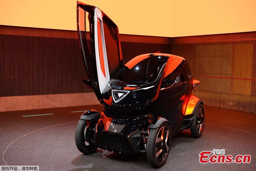Minimo, the new all-electric a two-seater concept vehicle by the Spanish car-maker SEAT, is displayed inside company\'s booth after being unveiled at the Mobile World Congress in Barcelona, Spain, Feb. 26, 2019. The annual Mobile World Congress (MWC) runs from 25-28 February in Barcelona, where companies from all over the world gather to share new products. (Photo/Agencies)