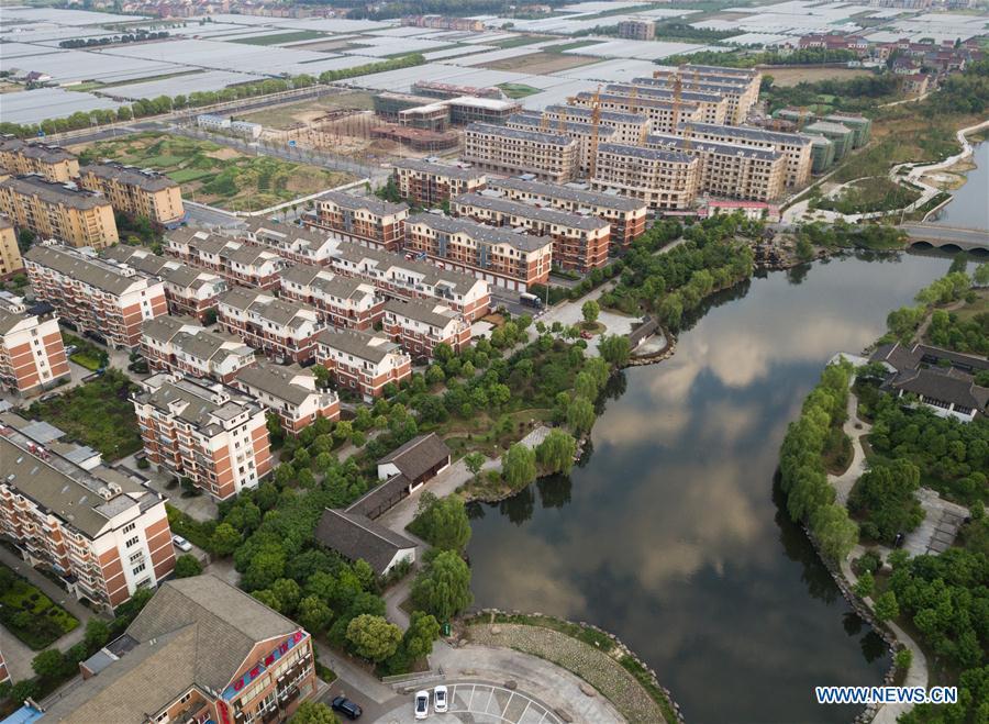 Aerial photo taken on April 21, 2018 shows the view of Xinye Village of Shaoxing City, east China\'s Zhejiang Province. As \