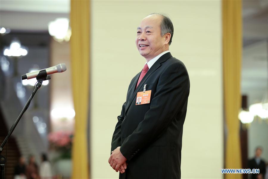 Wang Xiaotao, head of China International Development Cooperation Agency, receives an interview after the opening meeting of the second session of the 13th National Committee of the Chinese People\'s Political Consultative Conference (CPPCC) at the Great Hall of the People in Beijing, capital of China, March 3, 2019. (Xinhua/Cai Yang)