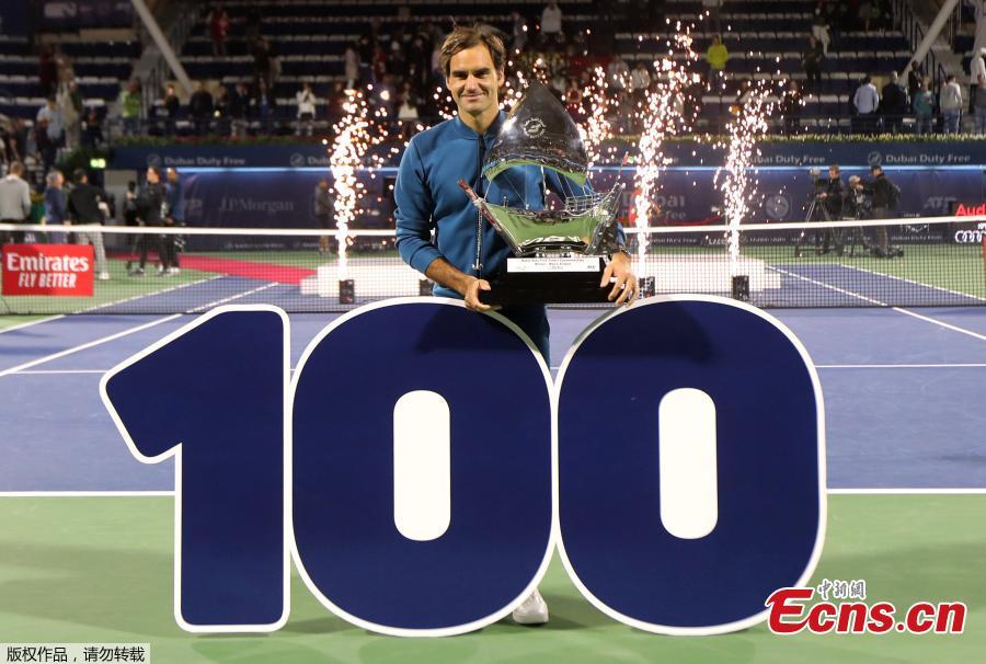 Roger Federer of Switzerland holds his trophy after winning the final match at the Dubai Duty Free Tennis Championship against Stefanos Tsitsipas of Greece, in Dubai, United Arab Emirates, March 2, 2019. Roger Federer claimed the 100th ATP title of his career by beating 20-year-old Greek Stefanos Tsitsipas 6-4 6-4. The 20-times Grand Slam champion became the second man in the Open Era to win 100 titles, after American Jimmy Connors who won 109. (Photo/Agencies)