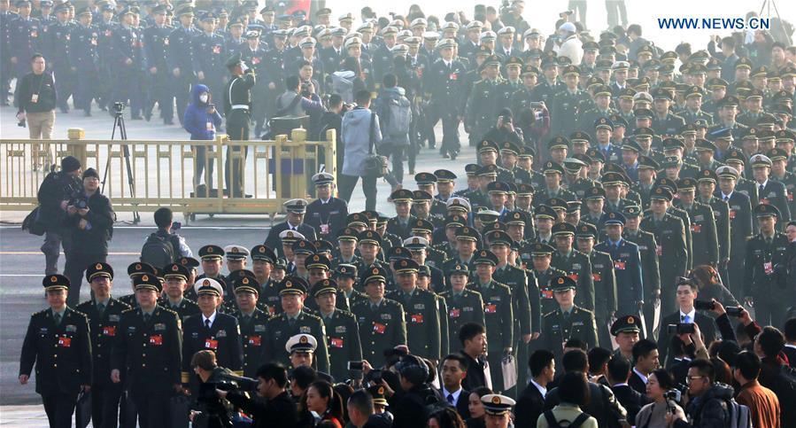 Deputies to the 13th National People\'s Congress (NPC) walk towards the Great Hall of the People for the opening meeting of the second session of the 13th NPC in Beijing, capital of China, March 5, 2019. (Xinhua/Li Gang)