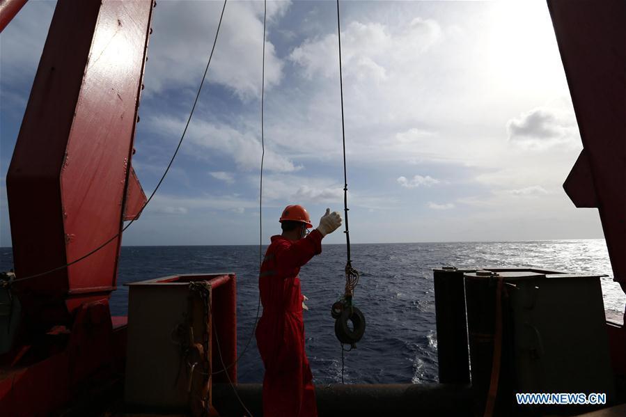 Photo taken on Feb. 28, 2019 shows a crew member maintaining the equipment aboard China\'s research icebreaker Xuelong. Xuelong, carrying members of China\'s 35th research mission to Antarctica, crossed the equator and returned to the Northern Hemisphere on early Monday morning. (Xinhua/Liu Shiping)