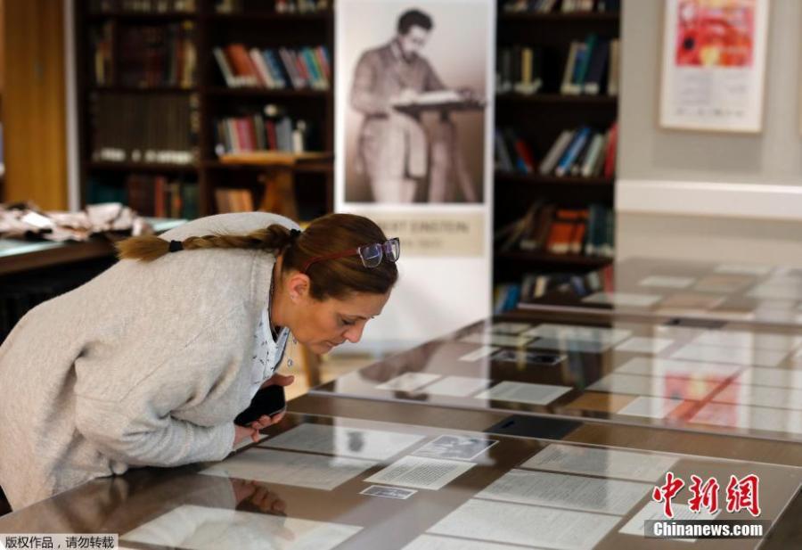 Part of a collection of 110 manuscript pages written by Albert Einstein are seen on display at the Givat Ram hebrew University of Jerusalem, March 6, 2019.  (Photo/Agencies)
