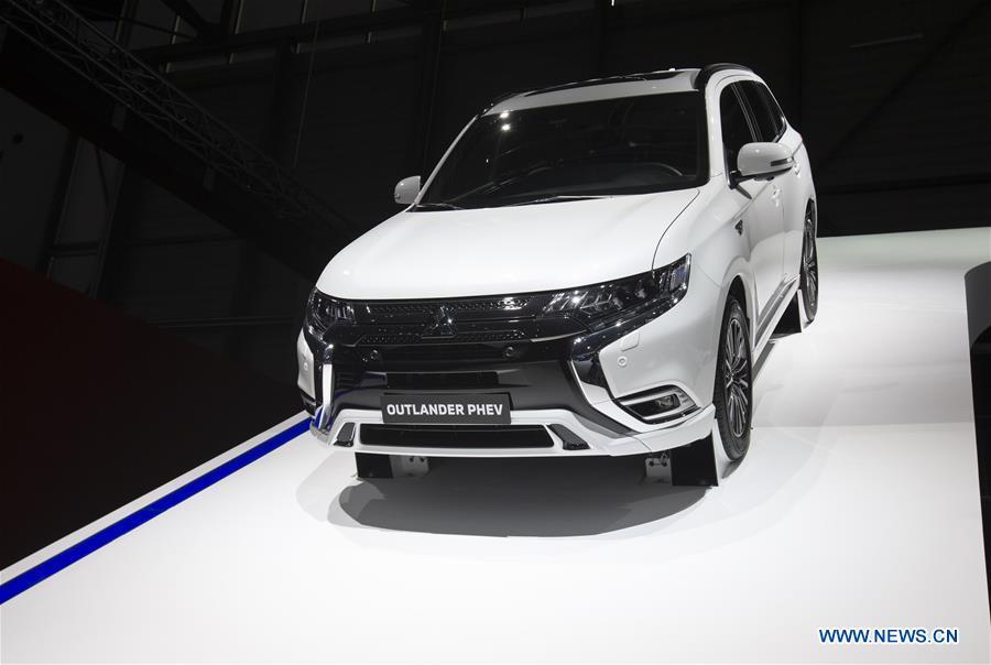 Photo taken on March 6, 2019 shows the new Mitsubishi Outlander PHEV at the 89th Geneva International Motor Show in Geneva, Switzerland. Electric cars and hybrid cars are highlights at this year\'s Geneva International Motor Show, which will open to the public from March 7 to 17. (Xinhua/Xu Jinquan)
