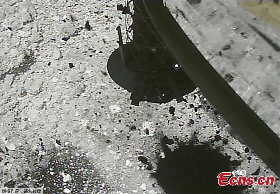 Japan\'s space agency released on March 6, 2019 an incredible video showing that its Hayabusa 2 probe dipped down, close to the surface of the asteroid known as Ryugu, fired a projectile at its surface, snatched some sample material, and then gently drifted back into its original position. (Photo/Agencies)