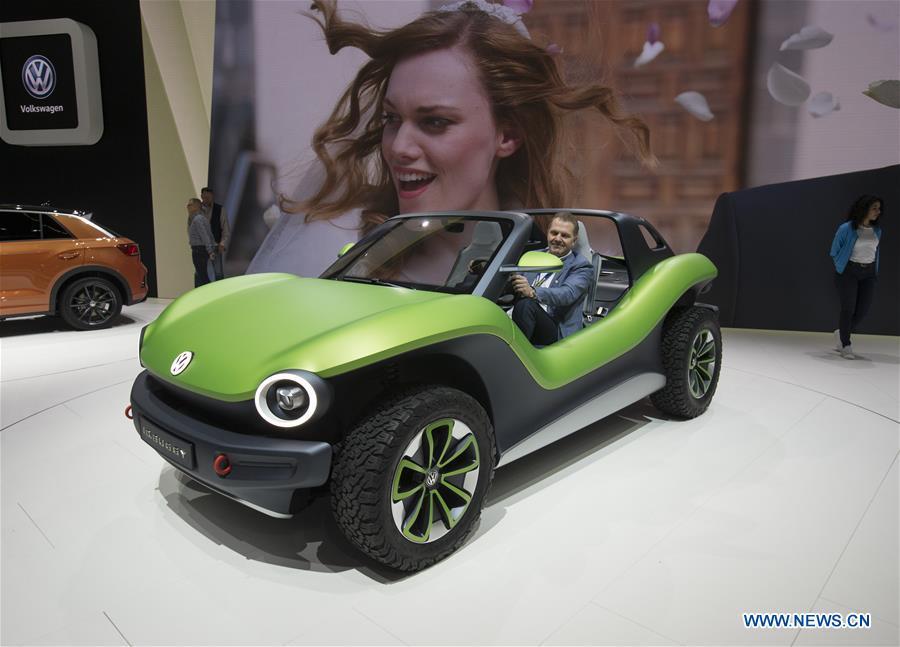 Photo taken on March 6, 2019 shows the Volkswagen all-electric ID.Buggy concept at the 89th Geneva International Motor Show in Geneva, Switzerland. Electric cars and hybrid cars are highlights at this year\'s Geneva International Motor Show, which will open to the public from March 7 to 17. (Xinhua/Xu Jinquan)