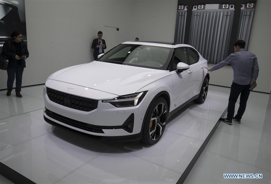 Photo taken on March 6, 2019 shows the all-electric Polestar 2 at the 89th Geneva International Motor Show in Geneva, Switzerland. Electric cars and hybrid cars are highlights at this year\'s Geneva International Motor Show, which will open to the public from March 7 to 17. (Xinhua/Xu Jinquan)