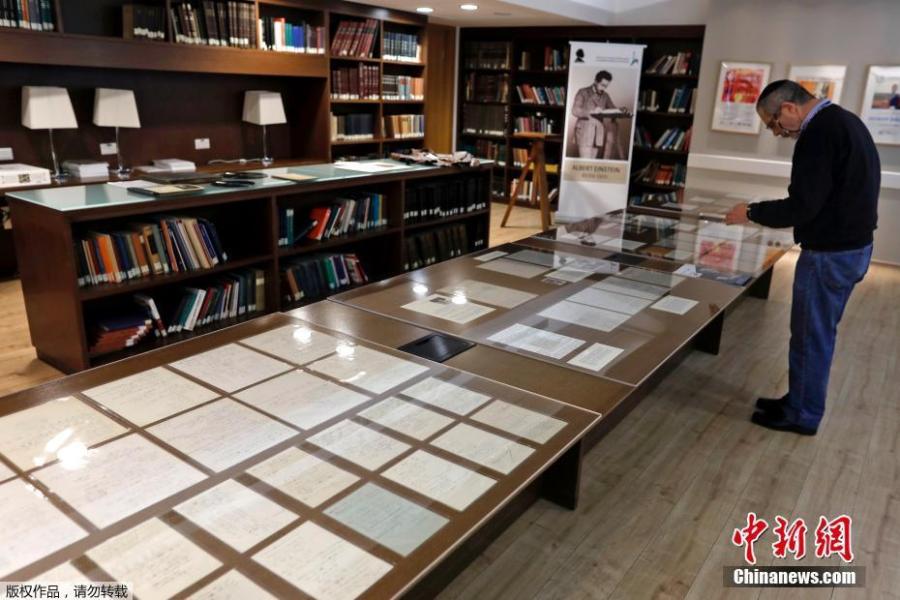 Part of a collection of 110 manuscript pages written by Albert Einstein are seen on display at the Givat Ram hebrew University of Jerusalem, March 6, 2019.  (Photo/Agencies)