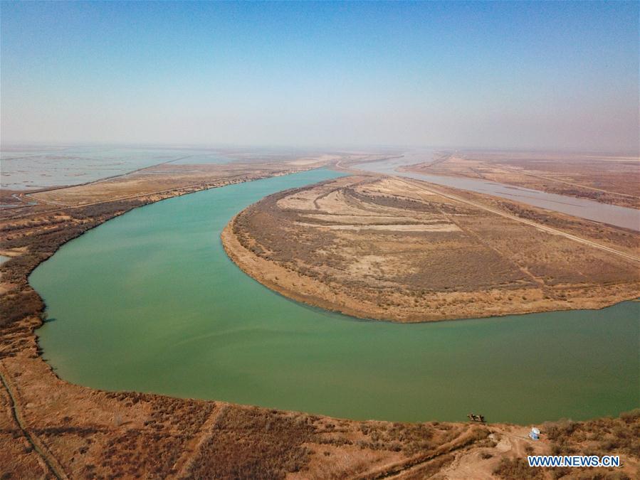 Aerial photo taken on March 7, 2019 shows the view of the Yellow River Delta national natural reserve in Dongying, east China\'s Shandong Province. The Yellow River Delta national natural reserve lies in Dongying City, from where the Yellow River empties itself into the Bohai Sea. In recent years, the natural reserve has been making efforts to protect ecological diversity and restore wetland in order to promote a harmonious coexistence between man and nature. (Xinhua/Wang Nan)