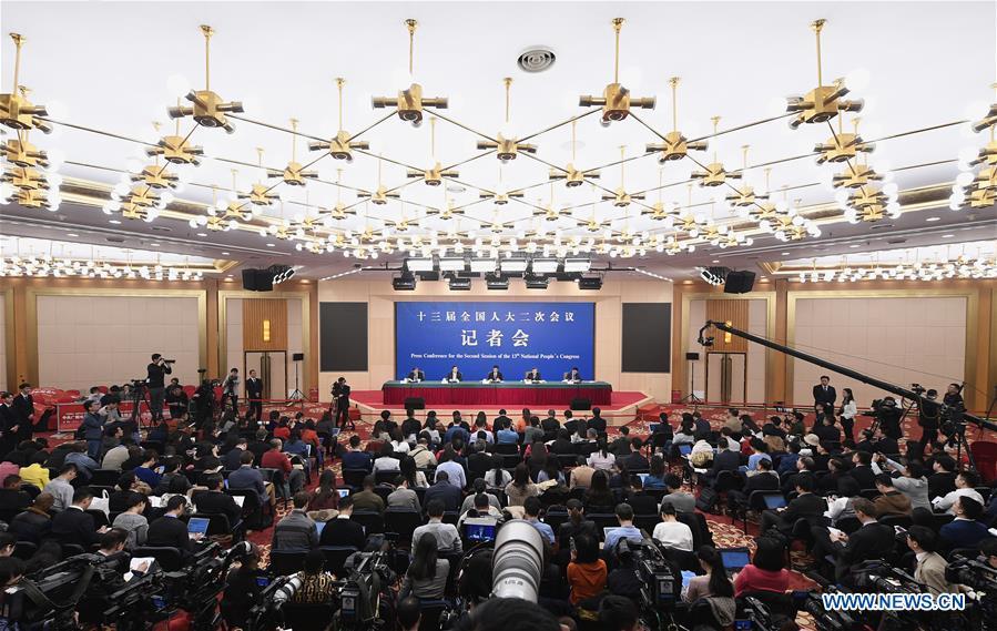 China\'s Minister of Commerce Zhong Shan, Vice Minister of Commerce and Deputy China International Trade Representative Wang Shouwen and Vice Minister of Commerce Qian Keming attend a press conference on China\'s domestic market and all-round opening-up for the second session of the 13th National People\'s Congress (NPC) in Beijing, capital of China, March 9, 2019. (Xinhua/Wang Peng)