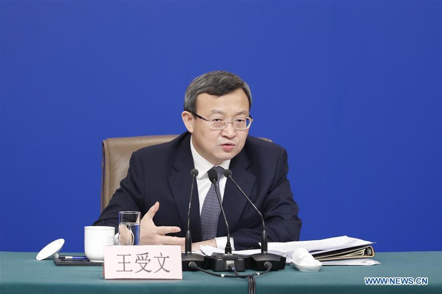 Vice Minister of Commerce and Deputy China International Trade Representative Wang Shouwen attends a press conference on China\'s domestic market and all-round opening-up for the second session of the 13th National People\'s Congress (NPC) in Beijing, capital of China, March 9, 2019. (Xinhua/Shen Bohan)
