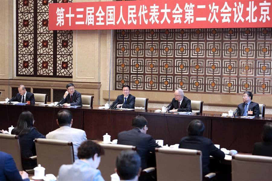 Chinese Vice Premier Han Zheng, also a member of the Standing Committee of the Political Bureau of the Communist Party of China (CPC) Central Committee, joins deliberation of the Beijing delegation at the second session of the 13th National People\'s Congress in Beijing, capital of China, March 8, 2019. (Xinhua/Liu Bin)