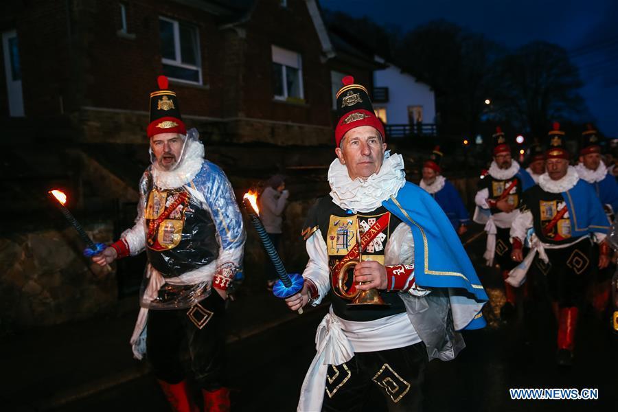 Local residents wearing traditional costumes attend the \