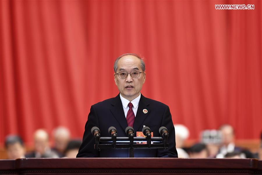 Zhang Jun, procurator-general of the Supreme People\'s Procuratorate (SPP), delivers a report on the SPP\'s work at the third plenary meeting of the second session of the 13th National People\'s Congress (NPC) at the Great Hall of the People in Beijing, capital of China, March 12, 2019. (Xinhua/Yan Yan)