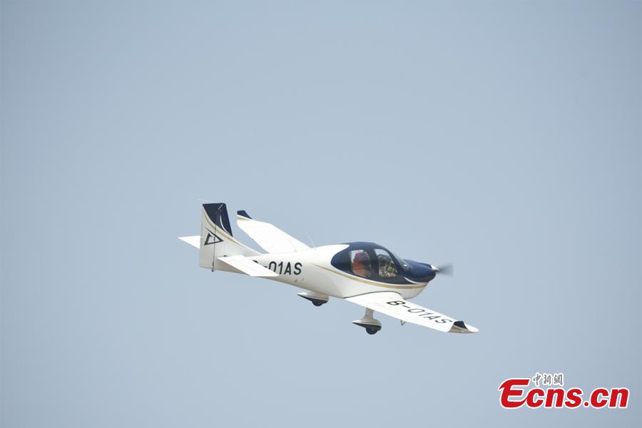 An aircraft developed by Guanyi General Aviation undergoes a test flight at Hengdian Airport in Zhejiang Province, March 11, 2019. The private company said independent intellectual property rights had been secured for the general-purpose aircraft GA20. The 30-minute test flight showed the aircraft flew smoothly and landed safely. (Photo provided to China News Service)