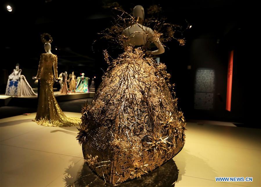 Photo taken on March 7, 2019 shows creations of Chinese couturier Guo Pei at her \