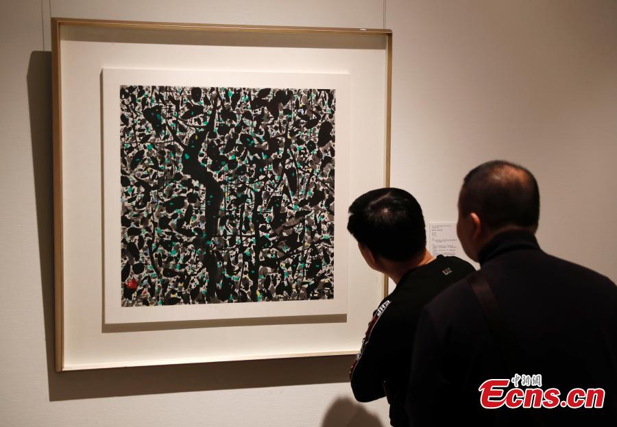 Visitors attend an exhibition of paintings by Wu Guanzhong (1919-2010) at the Poly Art Museum in Beijing, March 19, 2019. This year marked the 100th anniversary of the birth of Wu, a contemporary Chinese painter widely recognized as a founder of modern Chinese painting. The exhibition focused on Wu\'s idea that \
