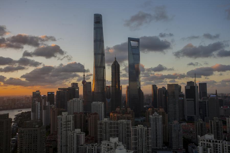 Jinmao Tower was surpassed by the 492-meter Shanghai World Financial Center in 2007 and the 632-meter Shanghai Tower in 2015. The three buildings create the world\'s first trio of adjacent supertall skyscrapers.  (Photo by Zheng Xianzhang/for chinadaily.com.cn)