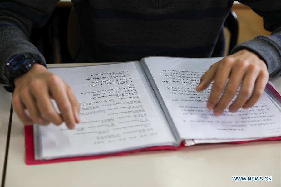 Photo taken on March 18, 2019 shows the learning materials in Chinese at Rome Convitto Nazionale Vittorio Emanuele II, an Italian boarding school, in Rome, Italy. Receiving Chinese President Xi Jinping\'s reply to their letter, students at the Italian boarding school were surprised, excited and encouraged. TO GO WITH Feature: Italian students encouraged by Xi\'s letter (Xinhua/Cheng Tingting)