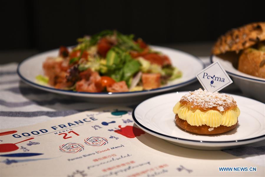 Photo taken on March 21, 2019 shows dishes French baker Christophe made for an activity called \