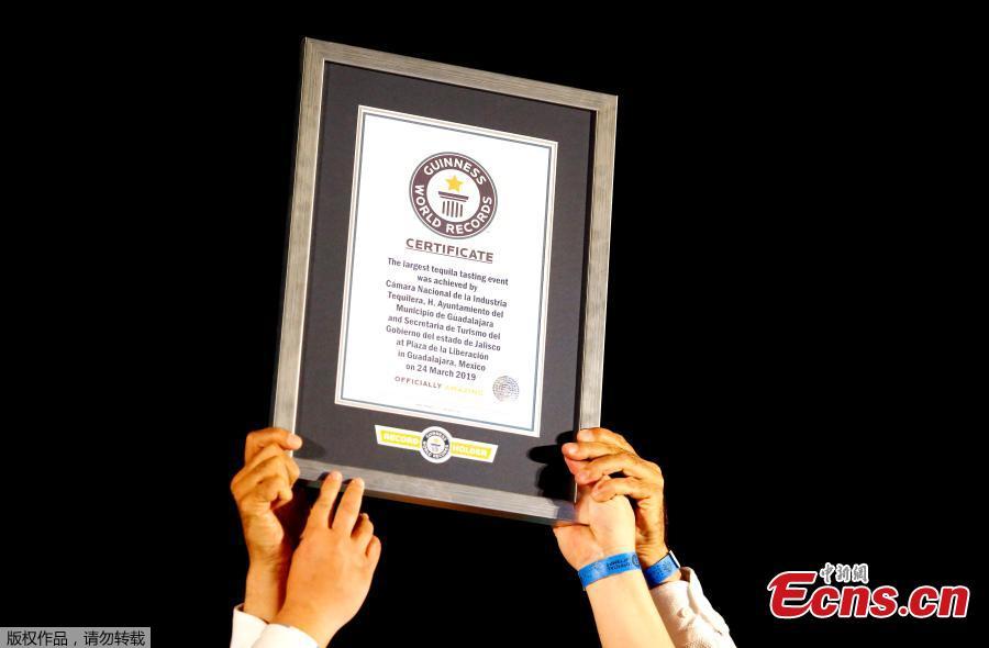 The Guinness World Record Officer Natalia Ramirez delivers the certificate for \