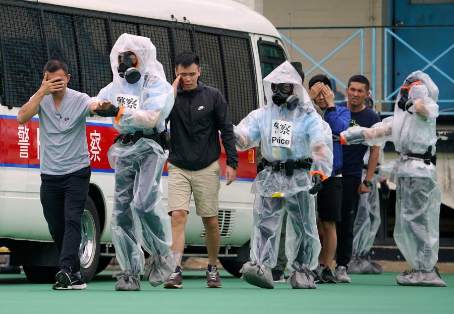 An anti-terrorism drill, code-named Powersky, takes place at Lei Yue Mun Park, Hong Kong, March 25, 2019. The drill simulated scenarios including a terrorist attack with explosives and toxic chemical gas. The operation was aimed at promoting counter-terrorism awareness among the public and enhancing coordination in the Inter-departmental Counter Terrorism Unit (ICTU), established in April 2018. (Photo: China News Service/Zhang Wei)