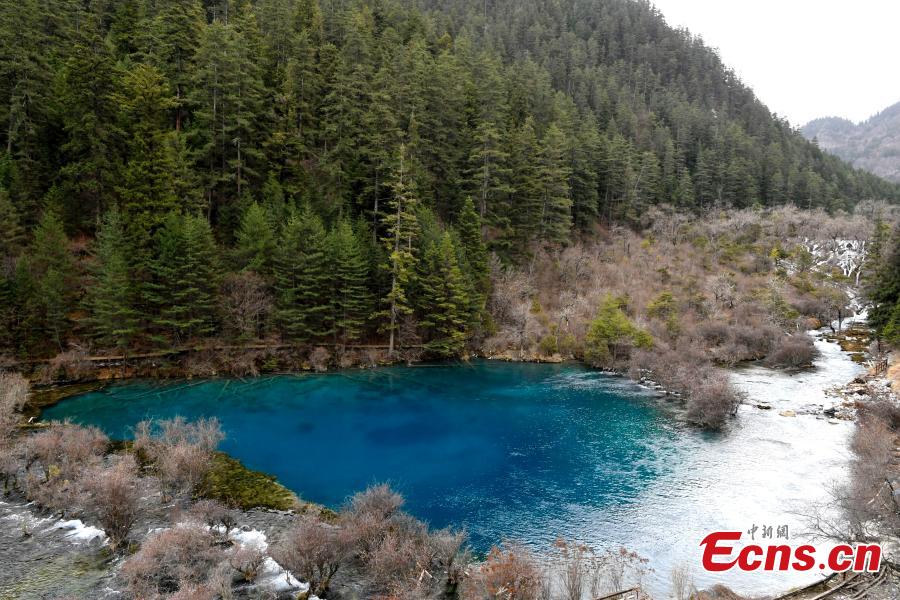Snow and ice begin to melt as spring arrives in the Jiuzhaigou Valley Scenic Area in Sichuan Province, a UNESCO world heritage site, March 25, 2019. Jiuzhaigou, which literally means \