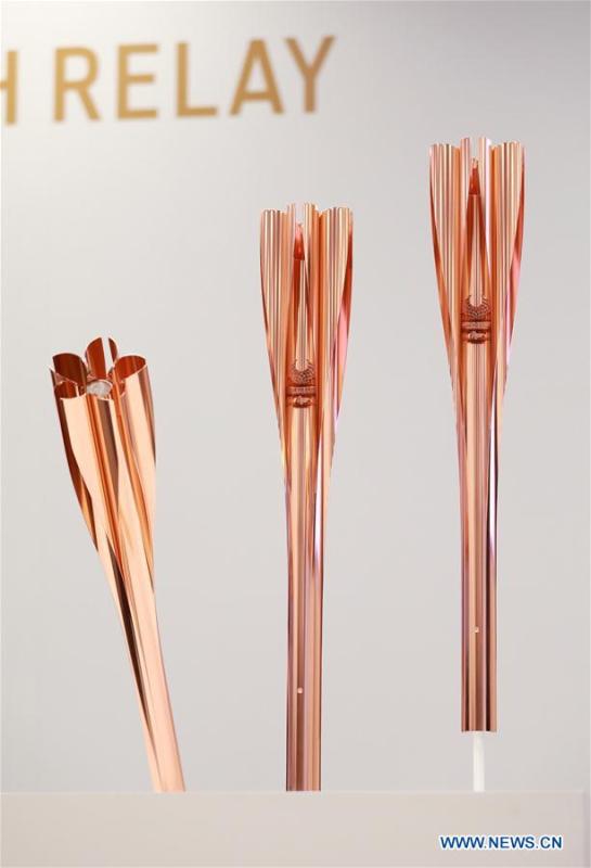 Photo taken in Tokyo, Japan, on March 25, 2019, shows the samples of the Tokyo 2020 Paralympic Torch. Tokyo 2020 unveiled the sample of the Tokyo 2020 Paralympic Torch on Monday. The color of Tokyo 2020 Paralympic Torch is cherry blossom pink. Aluminum recycled from temporary housing used in areas struck by the Great East Japan Earthquake disaster will be used to manufacture the torch. (Xinhua/Du Xiaoyi)