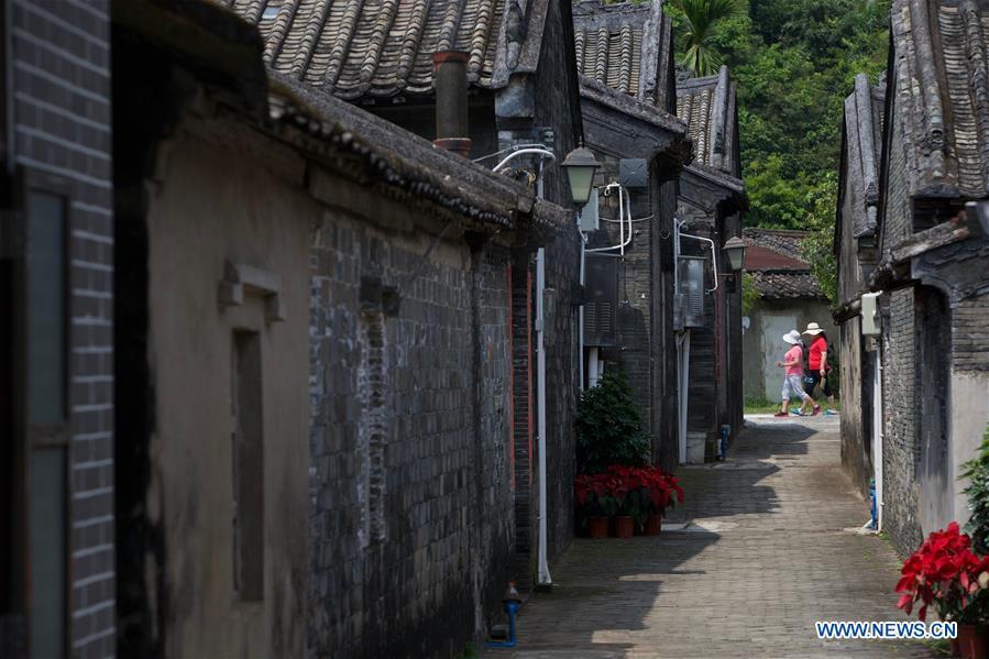People visit Nanqiang Village in Boao Town, Qionghai City, south China\'s Hainan Province. Qionghai City has quickened its steps towards the construction of \