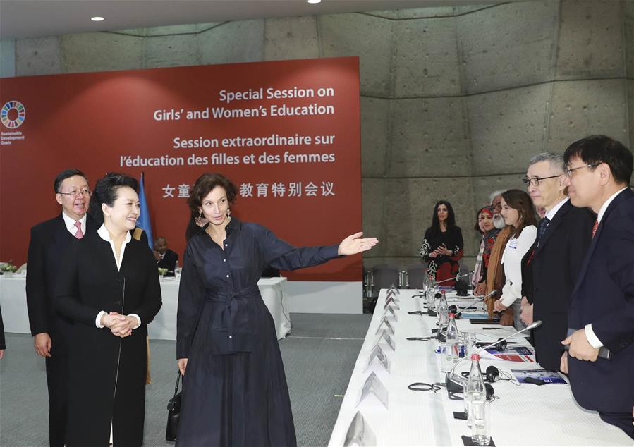 Peng Liyuan, wife of Chinese President Xi Jinping, and UNESCO special envoy for the advancement of girls\' and women\'s education, attends the special session on girls\' and women\'s education in Paris, France, March 26, 2019. (Xinhua/Ding Lin)