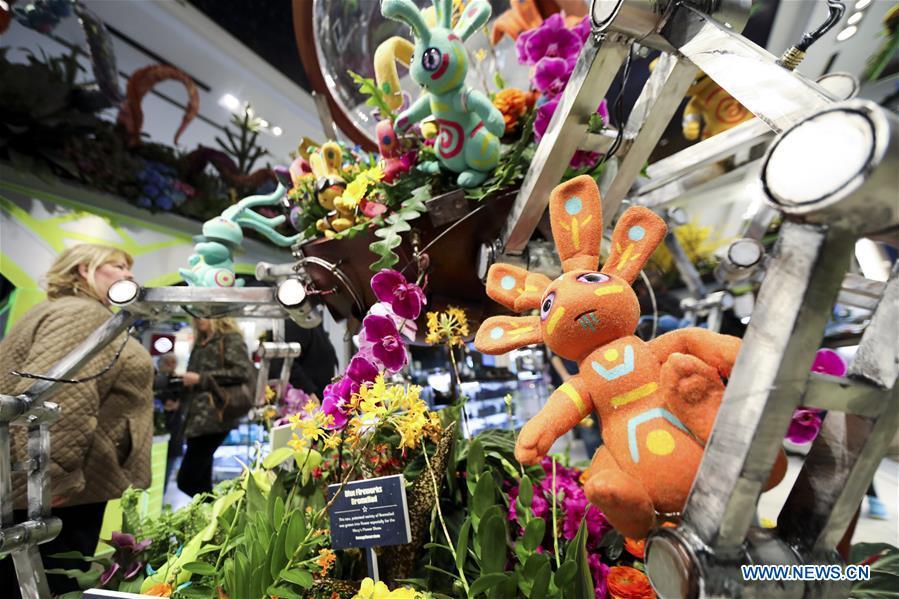 People visit Macy\'s Flower Show at Macy\'s Herald Square flagship store in New York, the United States, on March 25, 2019. The annual flower show is held from March 24 to April 7 this year. With the theme of \