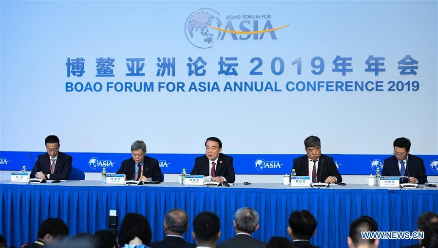 The Boao Forum for Asia (BFA) Secretary General Li Baodong (C) speaks at a press conference of the BFA annual conference in Boao, south China\'s Hainan Province, March 26, 2019. (Xinhua/Yang Guanyu)