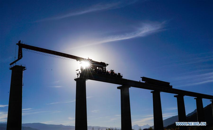Photo taken on Oct. 16, 2018 shows construction site of Lhasa-Nyingchi railway in southwest China\'s Tibet Autonomous Region. Infrastructure has been improved in Tibet, as a comprehensive transportation network composed of highways, railways and air routes has been formed. (Xinhua/Purbu Zhaxi)