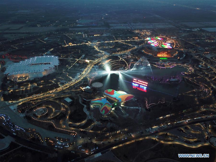 Aerial photo taken on March 26, 2019 shows the night view at the site of the International Horticultural Exhibition 2019 Beijing China (Expo 2019 Beijing) in Yanqing District of Beijing, capital of China. The 2019 Beijing International Horticultural Exhibition is slated to kick off on April 29, 2019. (Xinhua/Ju Huanzong)
