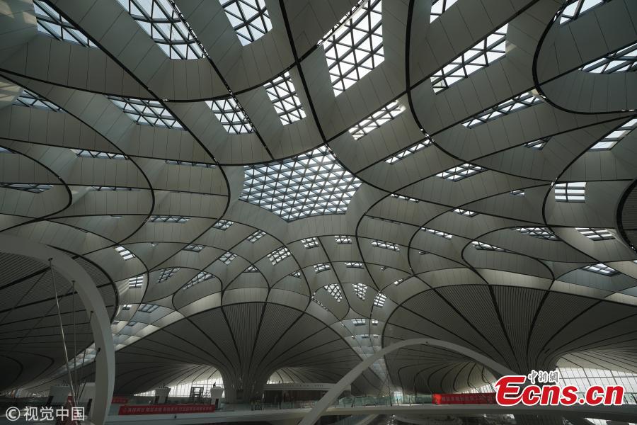 An inside view of the Beijing Daxing International Airport, which will be put into operation before September 30. The new airport sits at the junction of Beijing\'s southern Daxing District and Langfang, a city in Hebei Province. It is expected to handle 45 million passengers annually by 2021 and 72 million by 2025. (Photo/VCG)