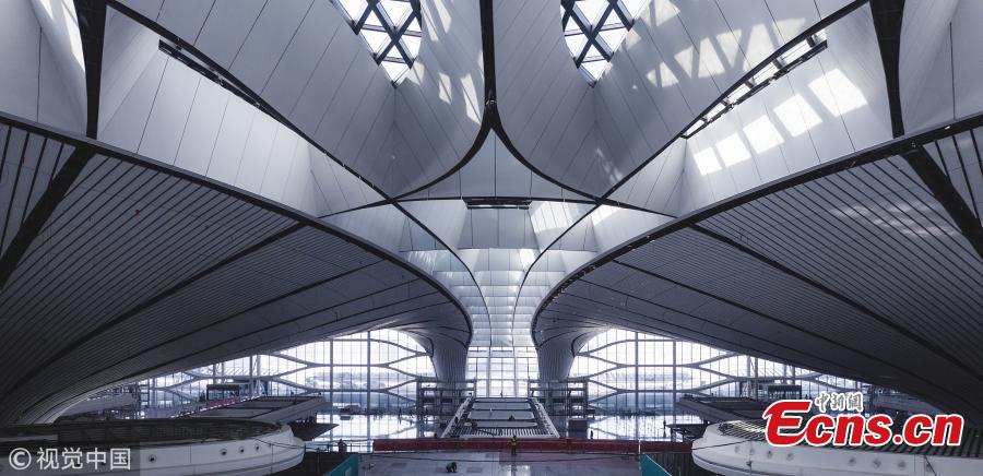 An inside view of the Beijing Daxing International Airport, which will be put into operation before September 30. The new airport sits at the junction of Beijing\'s southern Daxing District and Langfang, a city in Hebei Province. It is expected to handle 45 million passengers annually by 2021 and 72 million by 2025. (Photo/VCG)