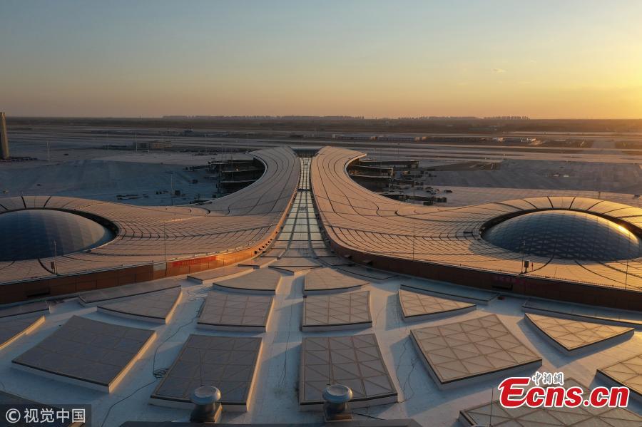 An outside view of the Beijing Daxing International Airport, which will be put into operation before September 30. The new airport sits at the junction of Beijing\'s southern Daxing District and Langfang, a city in Hebei Province. It is expected to handle 45 million passengers annually by 2021 and 72 million by 2025. (Photo/VCG)