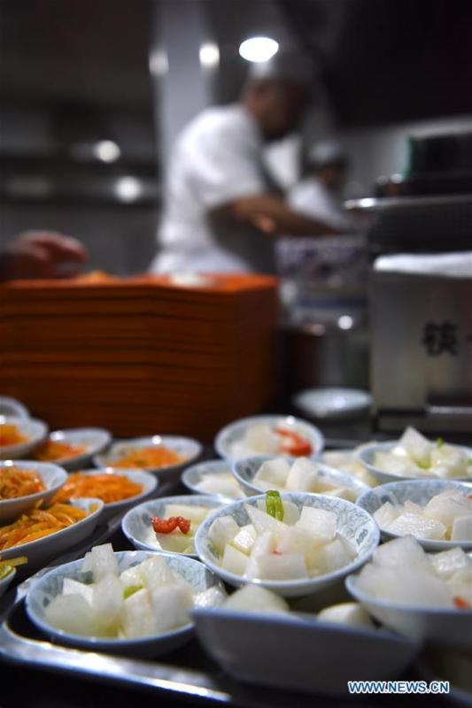 Photo taken on April 2, 2019 shows cold dishes at a beef noodle restaurant in Lanzhou, capital of northwest China\'s Gansu Province. Lanzhou beef noodles, a Chinese hand-pulled noodle originated in Lanzhou, has a history of about 100 years. There are about ten types of noodles of different width and shapes, depending on noodle chefs\' pulling skills. It has won fame both at home and abroad with its speciality of noodles and soup recipe. (Xinhua/Ma Ning)